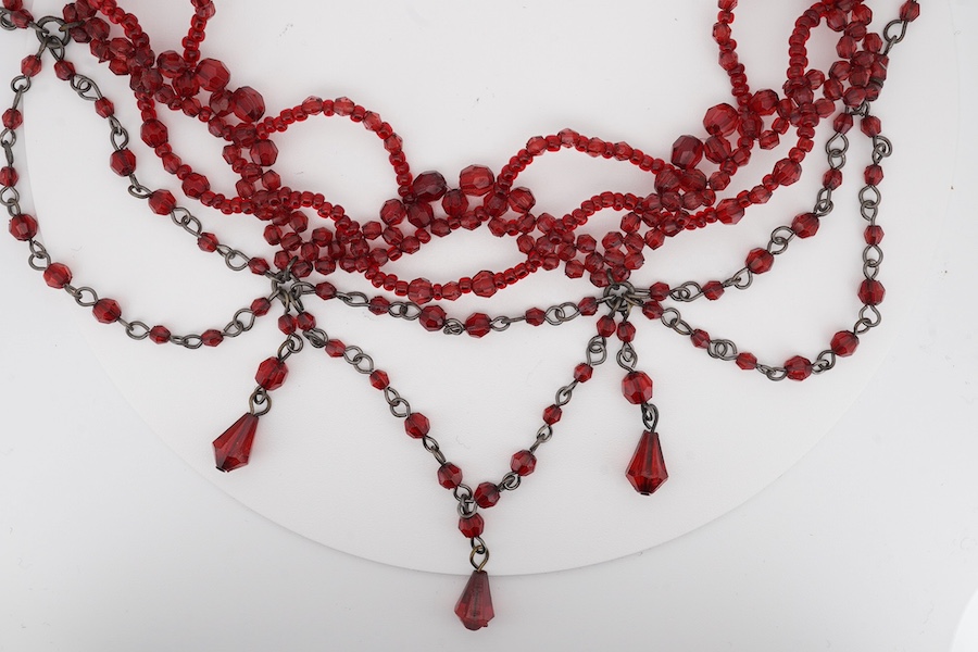 A red paste set drop fringe necklace, 30cm, together with a pair of 925 ear studs. Condition - poor to fair